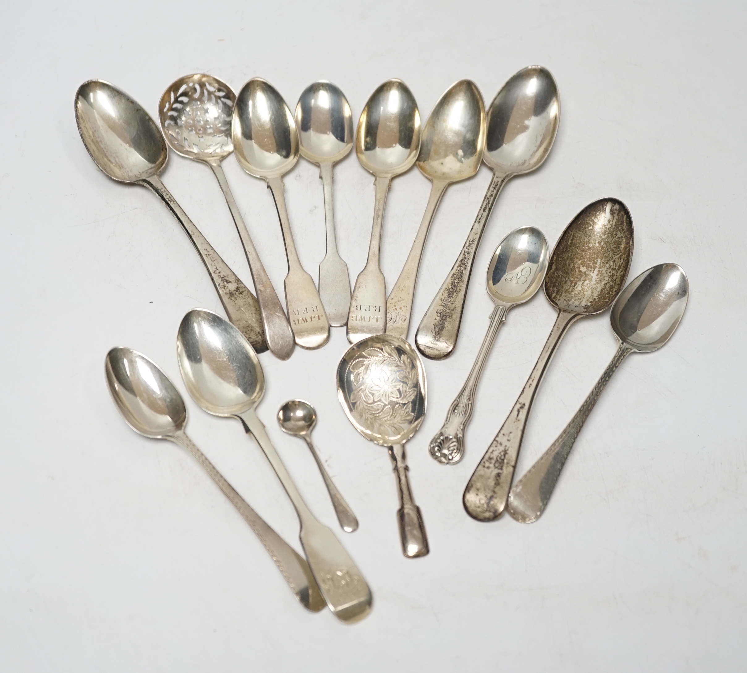 A quantity of assorted 18th century and later flatware, mainly teaspoons including a set of six base mark teaspoons, caddy spoon, etc, 32.7oz and eight plated spoons.